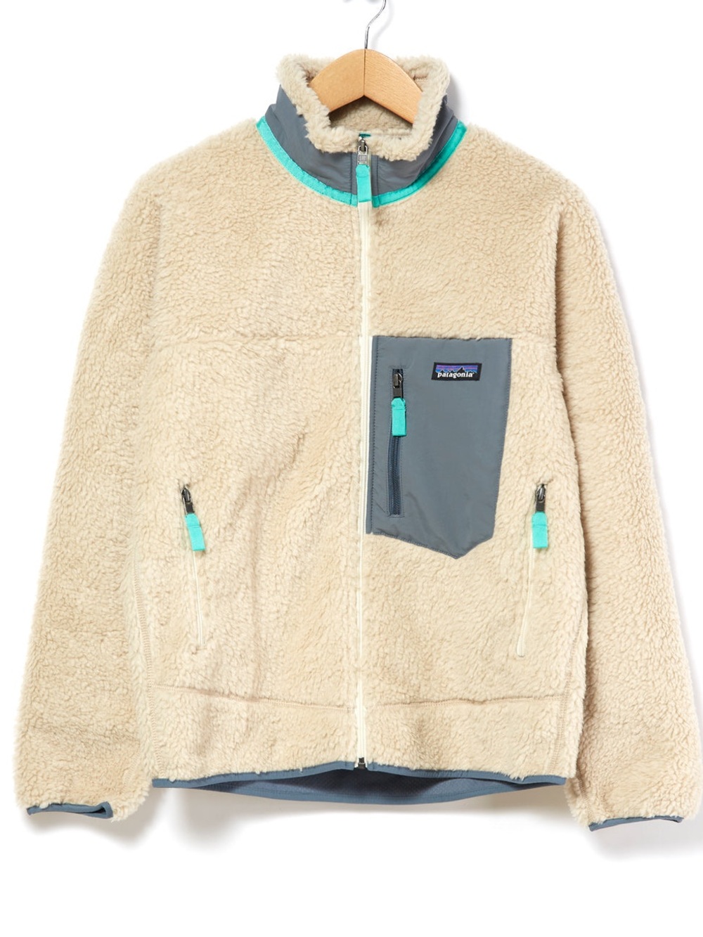Patagonia Retro X Cream Sherpa Jacket with Teal Accents and Gray Pocket